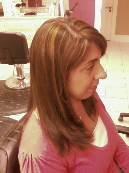 brown hair with caramel highlights. Caramel highlights were added