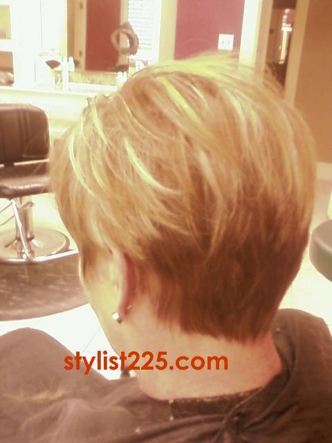 Short razored hair cut creates easy wash and go hair with minimal styling 